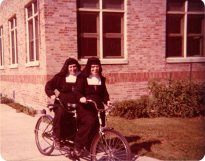 Sister Mary Genevive leads on the tandem -- many years ago